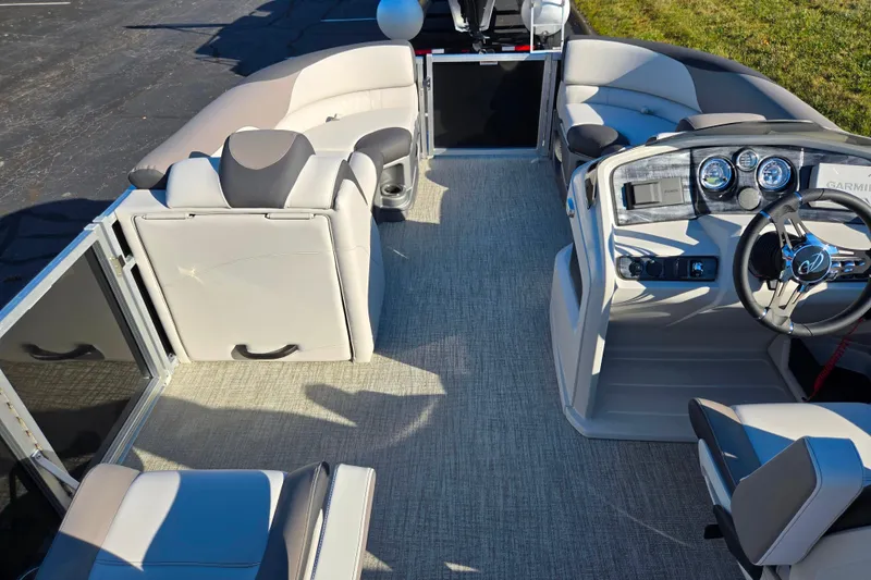 Slide: The Image of 2023 Avalon LSZ Quad Lounger interior with plush seating and modern dashboard. - 21
