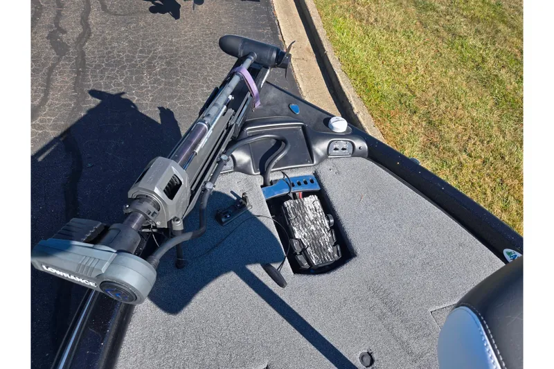 Slide: The Image of 2022 Phoenix 919 ProXP boat deck with trolling motor and control panel. - 14