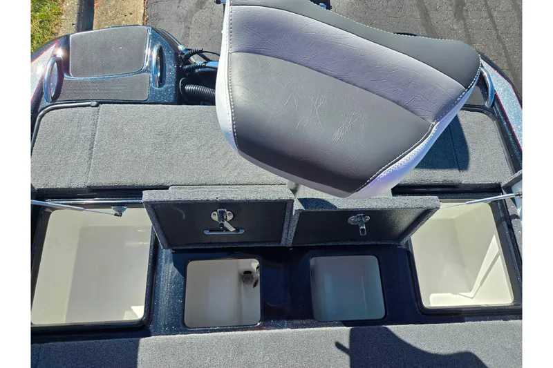 Slide: The Image of 2022 Phoenix 919 ProXP boat interior with storage compartments and cushioned seat. - 20
