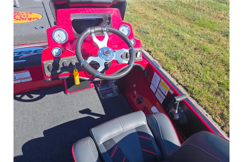 Slide: The Image of Steering console of a 2022 Nitro Z18 Pro boat with gauges and controls. - 12