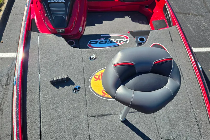 Slide: The Image of 2022 Nitro Z18 Pro boat interior with gray seating and red accents. - 17
