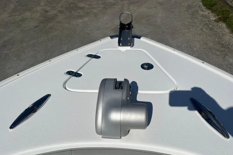 Slide: The Image of Bow of 2026 Cape Horn 27XS boat with anchor and hatch details. - 16