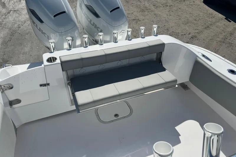 Slide: The Image of 2026 Cape Horn 27XS boat with dual Suzuki engines and foldable seating. - 7