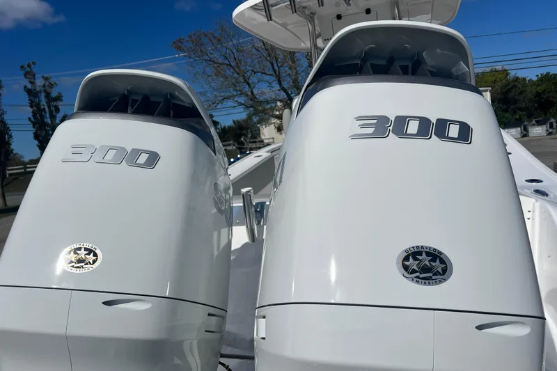 Slide: The Image of 2026 Cape Horn 27XS boat with dual 300 horsepower engines, ultra-low emission. - 19