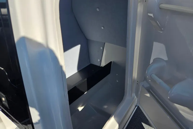 Slide: The Image of Interior storage compartment of a 2018 Yamaha Boats AR240. - 12