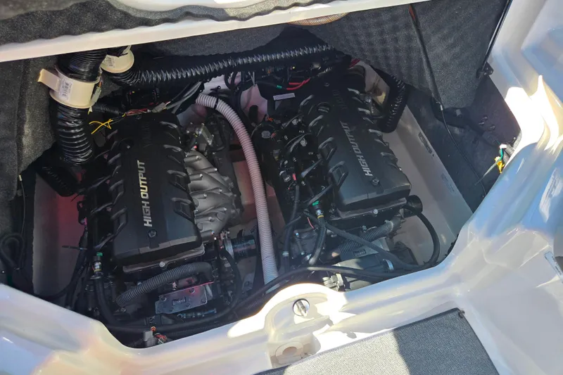 Slide: The Image of 2018 Yamaha AR240 boat engine compartment with high output engines. - 23