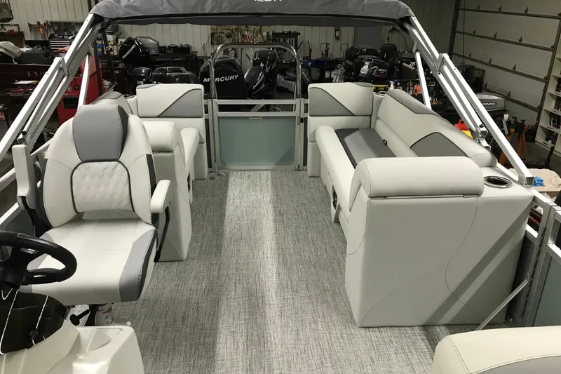 Slide: The Image of 2026 Avalon Venture Quad Lounger 19' interior with luxurious seating and modern design. - 14