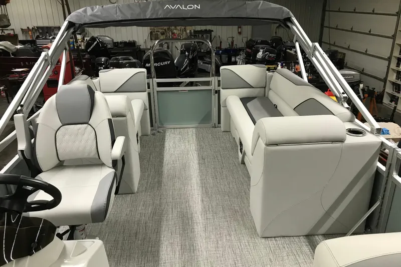 Slide: The Image of 2026 Avalon Venture Quad Lounger 19' interior with luxurious seating and modern design. - 15