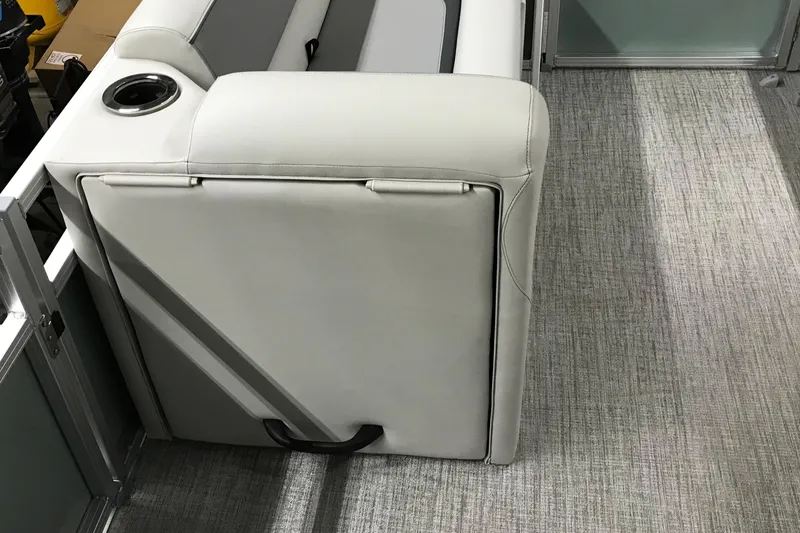 Slide: The Image of Avalon Venture Quad Lounger 19' 2026, featuring sleek seating and integrated cup holder. - 21