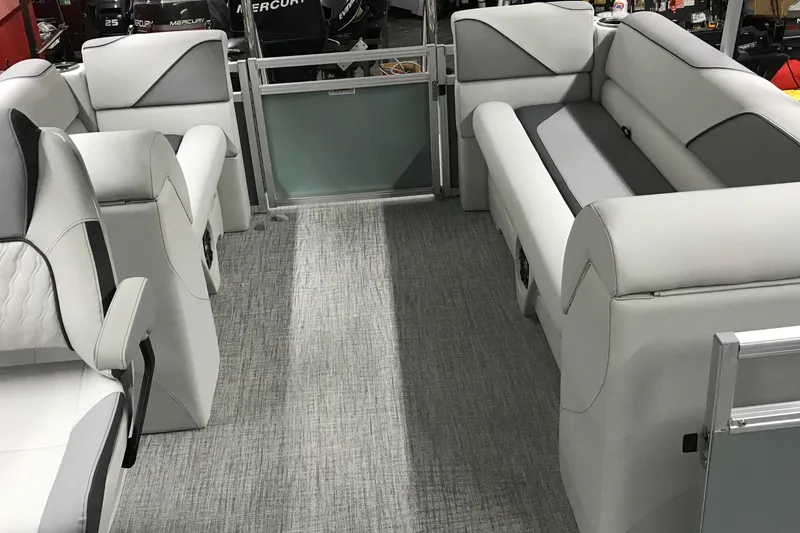 Slide: The Image of 2026 Avalon Venture Quad Lounger 19' interior with plush seating and modern design. - 25