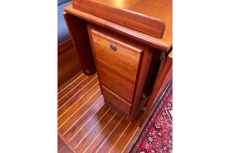 Slide: The Image of Wooden interior of 1995 Able Apogee 50 yacht, featuring polished cabinetry and flooring. - 26
