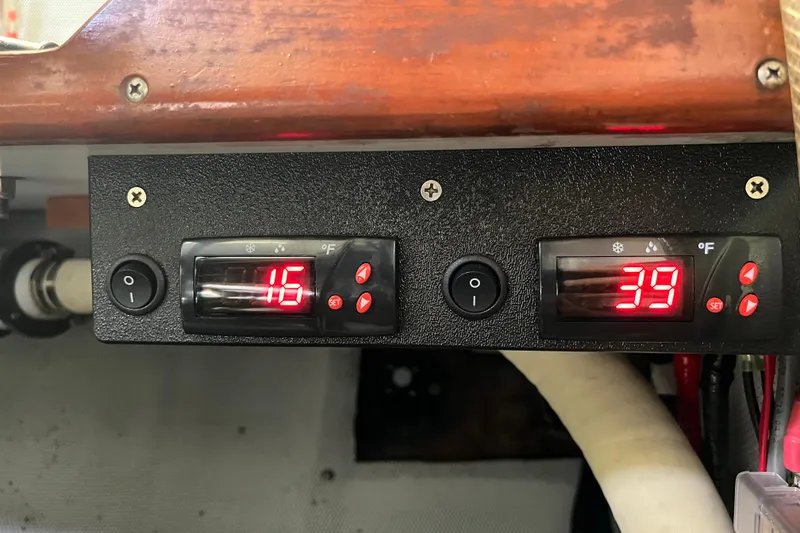 Slide: The Image of Control panel of a 1995 Able Apogee 50 with digital temperature displays. - 35