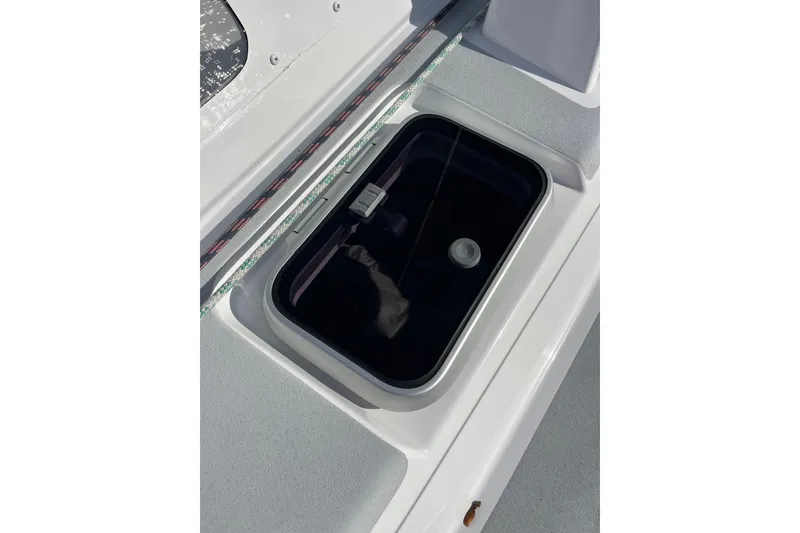 Slide: The Image of Open hatch on Able Apogee 50 sailboat, 1995 model, showing interior compartment. - 73
