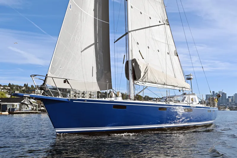 Slide: The Image of Blue Able Apogee 50 sailboat from 1995 sailing on a sunny day. - 75