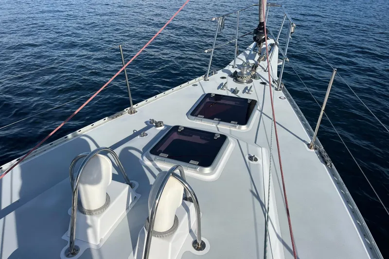 Slide: The Image of Deck of 1995 Able Apogee 50 sailboat with hatches and ocean view. - 42