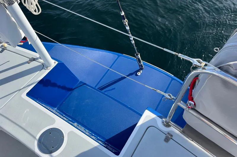 Slide: The Image of Deck view of 1995 Able Apogee 50 sailboat with blue accents and railing. - 62