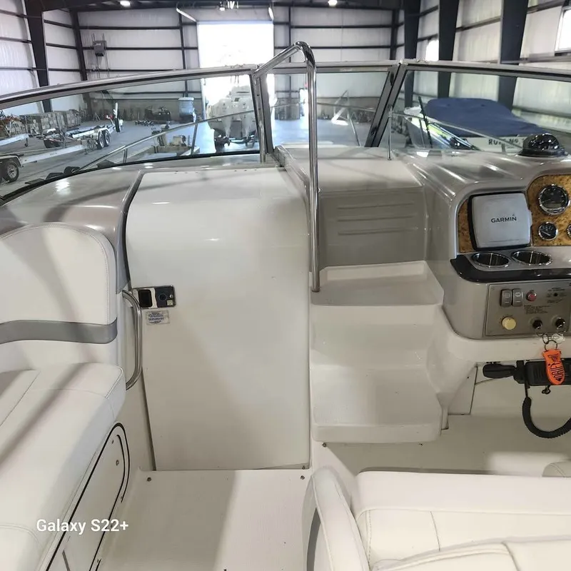 Slide: The Image of Interior view of a 2006 Formula 27 PC boat cockpit with Garmin navigation system. - 9