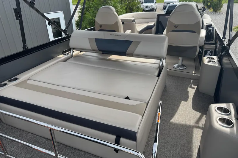 Slide: The Image of 2023 Viaggio DIAMANTE 23S boat interior with luxurious seating and cup holders. - 15