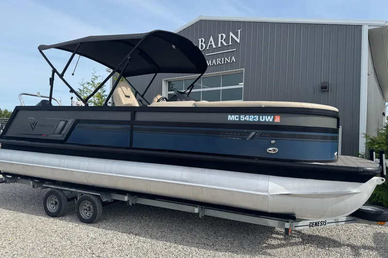 Slide: The Image of 2023 Viaggio DIAMANTE 23S pontoon boat on trailer at marina. - 4