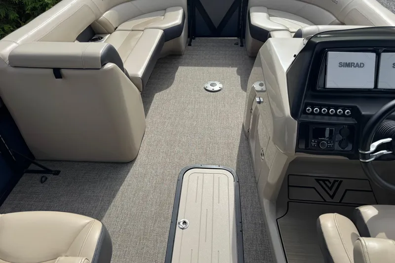 Slide: The Image of Interior of 2023 Viaggio DIAMANTE 23S boat with beige seating and modern dashboard. - 9
