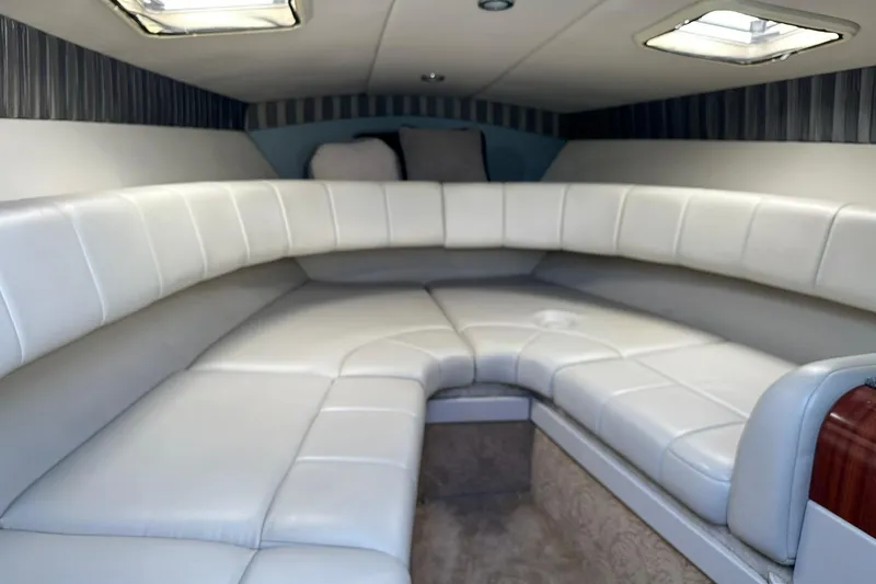 Slide: The Image of Interior of 2005 Formula 260 Sun Sport boat with white leather seating. - 17
