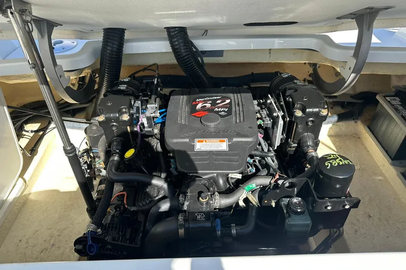 Slide: The Image of Engine compartment of a 2005 Formula 260 Sun Sport boat, featuring a MerCruiser 6.2 MPI engine. - 21