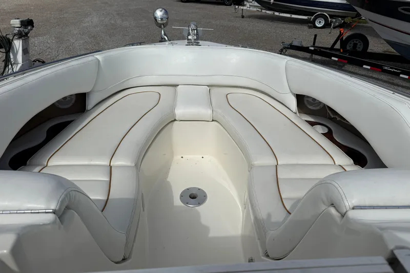 Slide: The Image of 2001 Sea Ray 280 Bow Rider with spacious white seating area. - 17