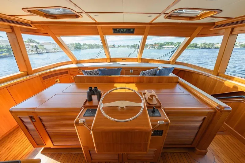 Slide: The Image of Luxurious 1984 Feadship Yacht Fish interior with wooden helm and panoramic windows. - 35