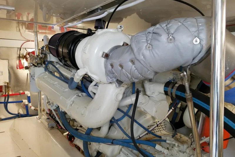 Slide: The Image of Engine room of Ocean Yachts 55 Super Sport 1982, featuring modernized components. - 38