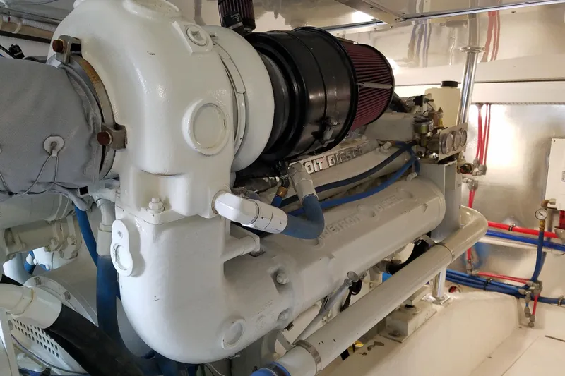 Slide: The Image of Engine room of Ocean Yachts 55 Super Sport 1982, featuring Detroit Diesel engine. - 39
