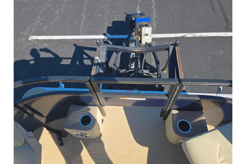 Slide: The Image of 2016 Crest II Fish 210 C4 boat interior with seating and cup holders. - 25