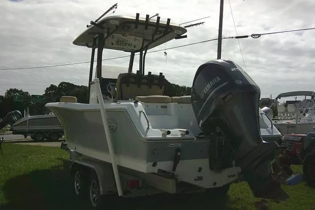 Slide: The Image of 2017 Sea Hunt Ultra 235 SE boat with Yamaha outboard motor on trailer. - 10