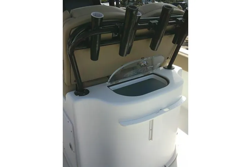 Slide: The Image of 2017 Sea Hunt Ultra 235 SE boat with rod holders and storage compartment. - 24