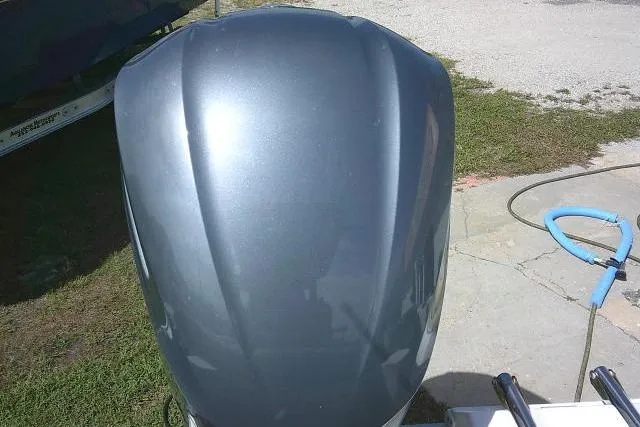 Slide: The Image of Close-up of a 2017 Sea Hunt Ultra 235 SE boat engine cover. - 30