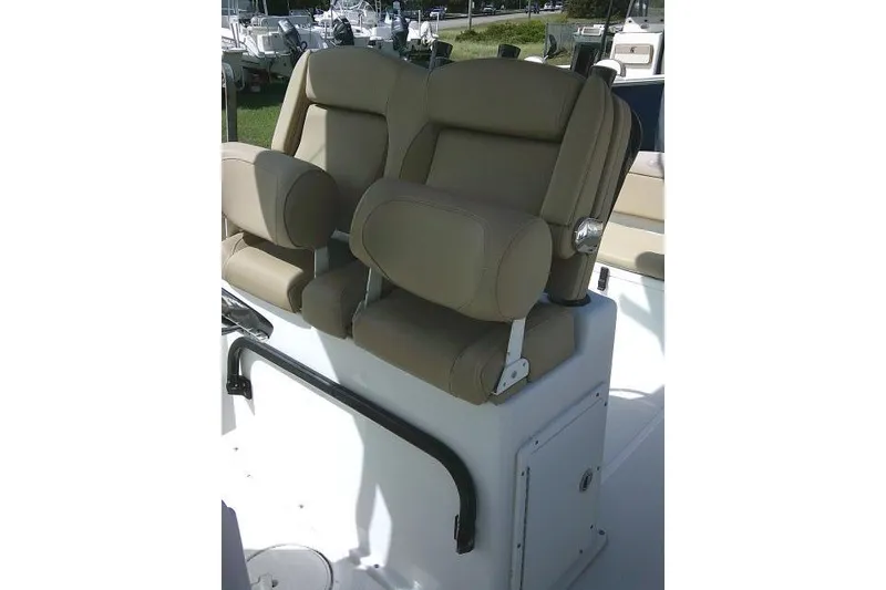Slide: The Image of 2017 Sea Hunt Ultra 235 SE boat seats, beige upholstery, dual seating arrangement. - 35