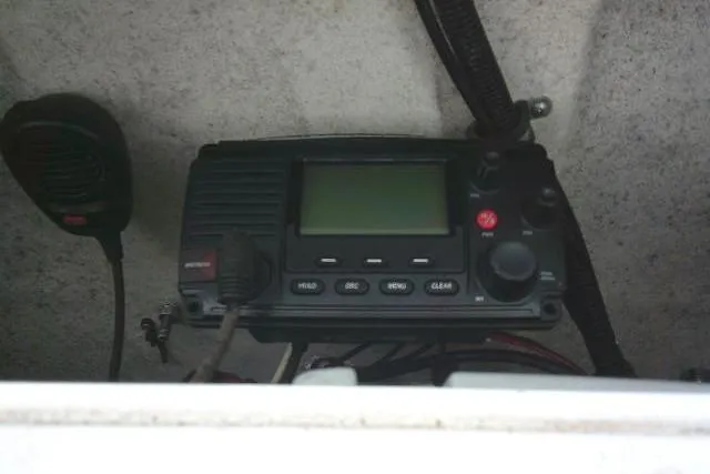 Slide: The Image of VHF radio system on 2017 Sea Hunt Ultra 235 SE boat dashboard. - 39