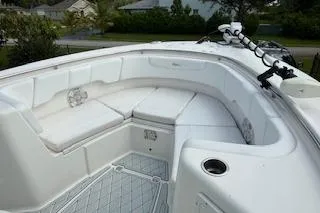 Slide: The Image of 2019 Robalo R300 Center Console boat with spacious seating and modern design. - 29