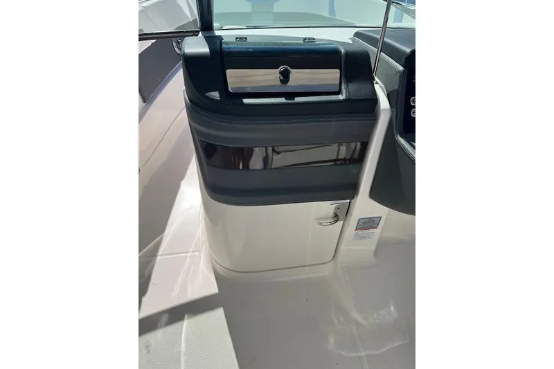 Slide: The Image of 2023 Chaparral 280 OSX boat interior console detail. - 21