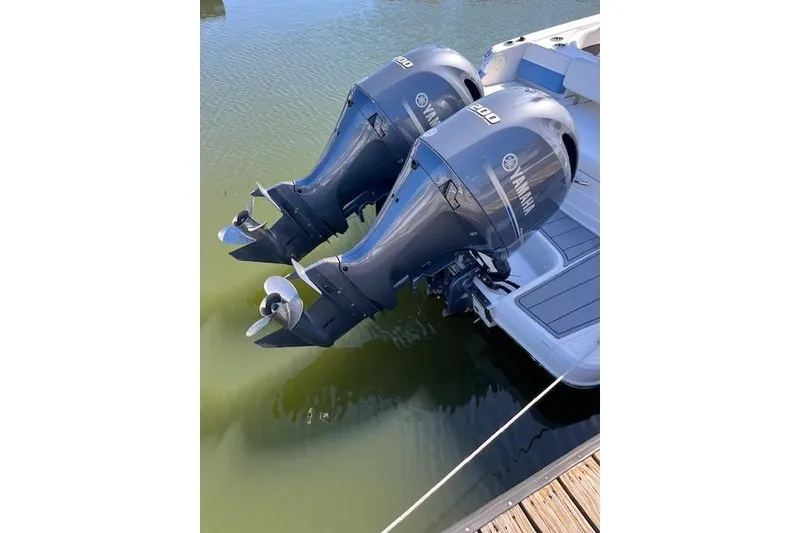 Slide: The Image of Twin Yamaha outboard engines on a 2023 Chaparral 280 OSX boat. - 24