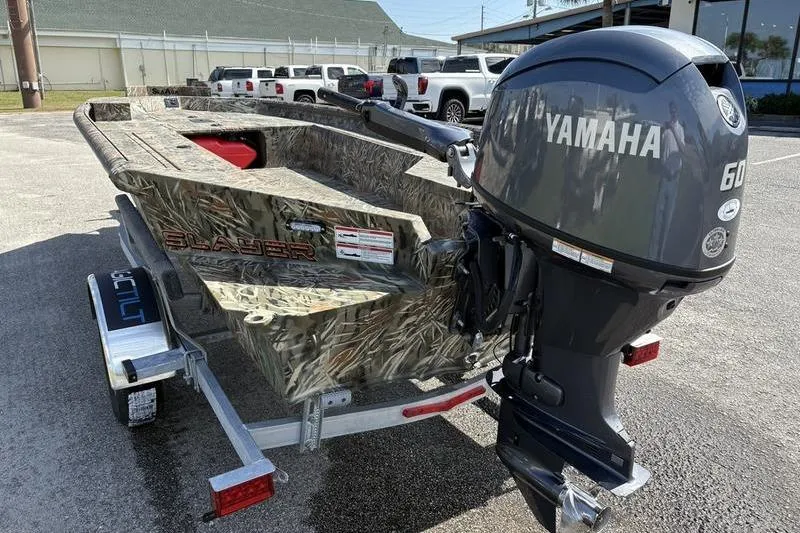 Slide: The Image of 2026 SeaArk 1752 Slayer boat with Yamaha 60HP engine on a trailer. - 1