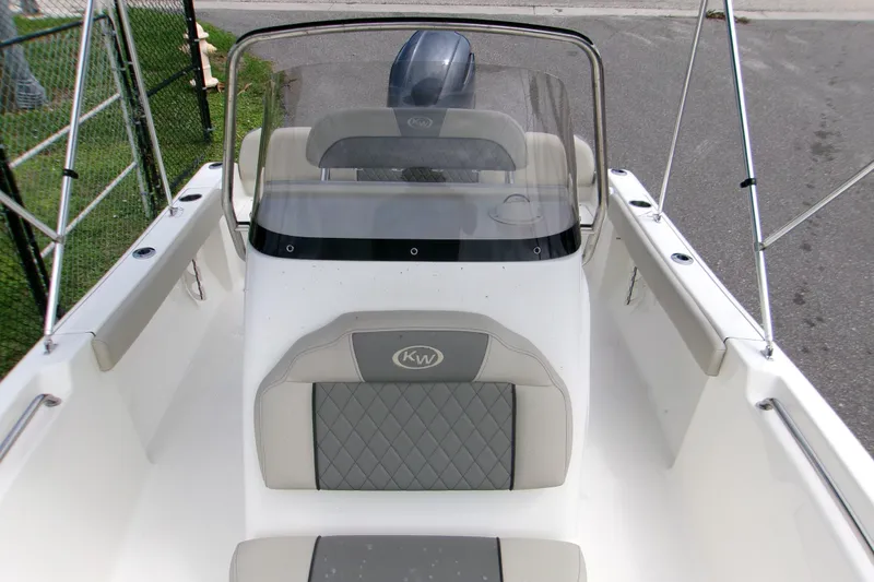 Slide: The Image of 2026 Key West 189 FS boat interior with seating and console. - 14