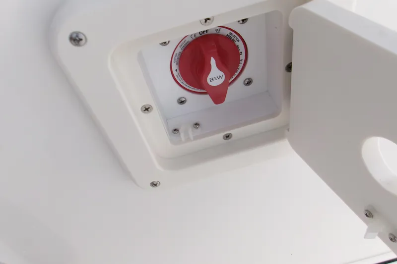 Slide: The Image of Battery switch on a 2026 Key West 189 FS boat, featuring a red knob. - 21