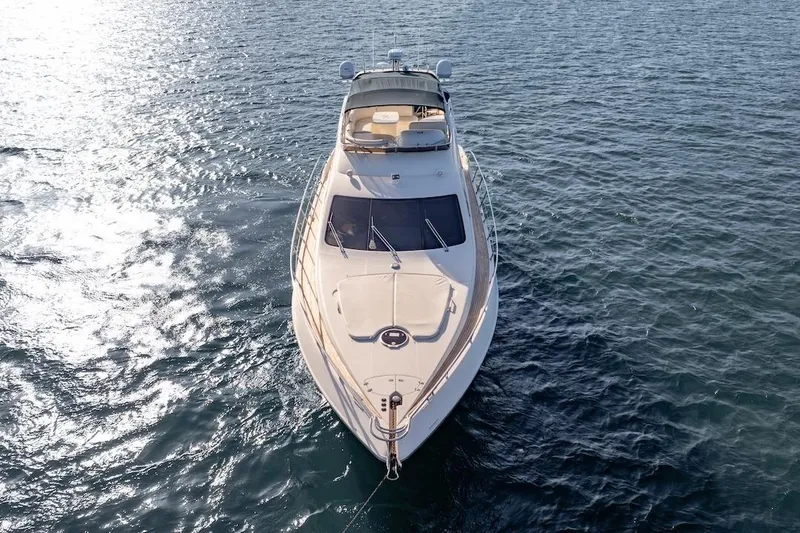 Slide: The Image of 2007 Azimut 62 Evolution yacht on open water, aerial view. - 11