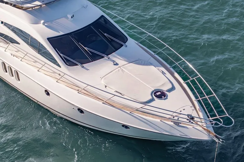 Slide: The Image of 2007 Azimut 62 Evolution yacht on water, showcasing sleek design and luxury features. - 17