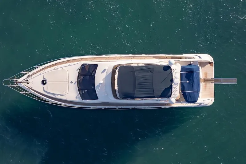 Slide: The Image of Top view of 2007 Azimut 62 Evolution yacht on open water. - 20