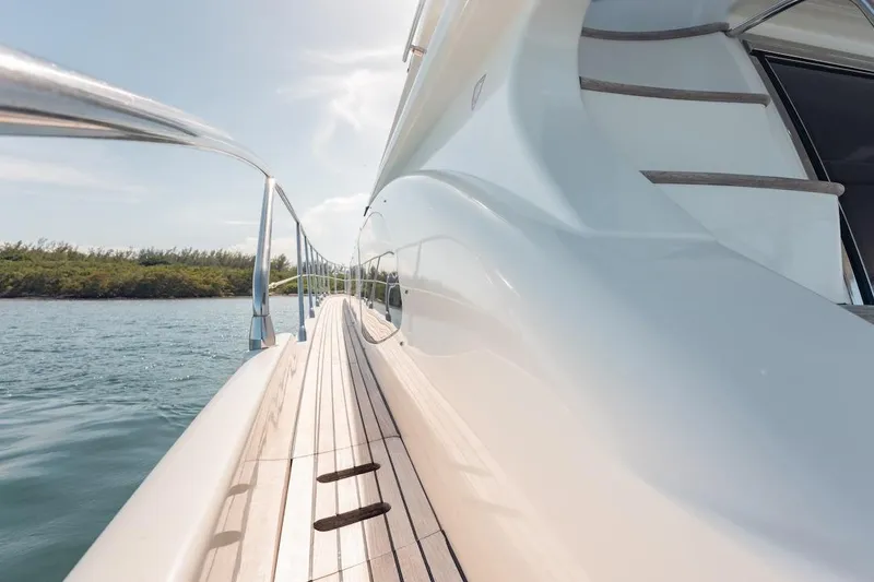 Slide: The Image of Side view of 2007 Azimut 62 Evolution yacht on calm water. - 25