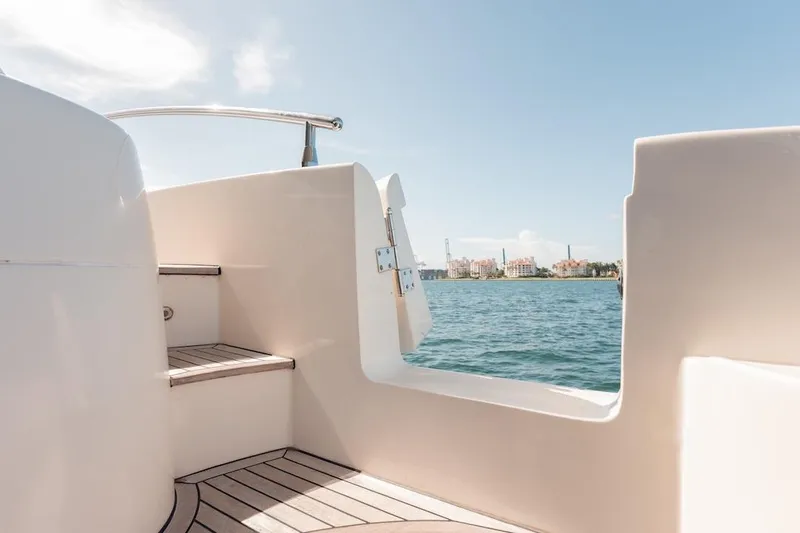 Slide: The Image of 2007 Azimut 62 Evolution yacht deck with ocean view and clear sky. - 29