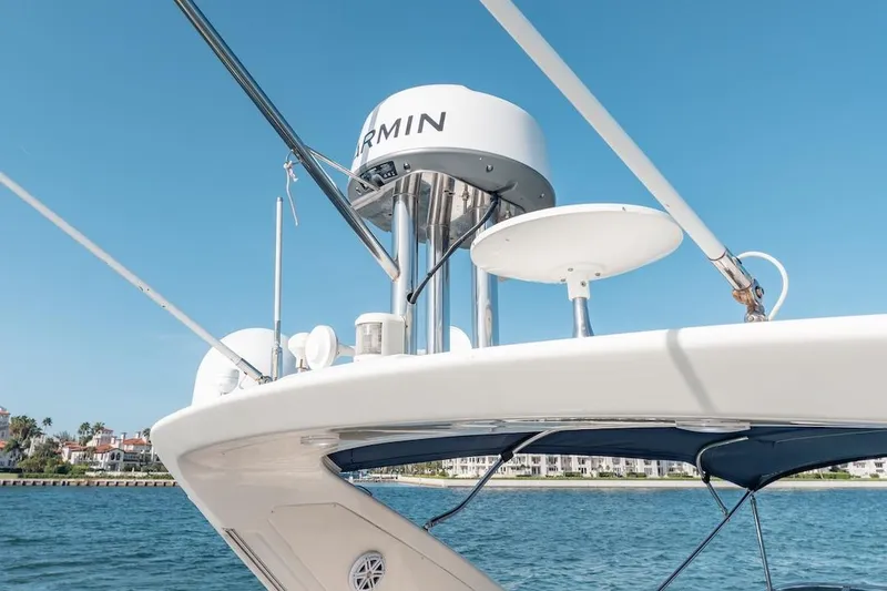 Slide: The Image of 2007 Azimut 62 Evolution yacht with Garmin radar, clear blue sky background. - 34