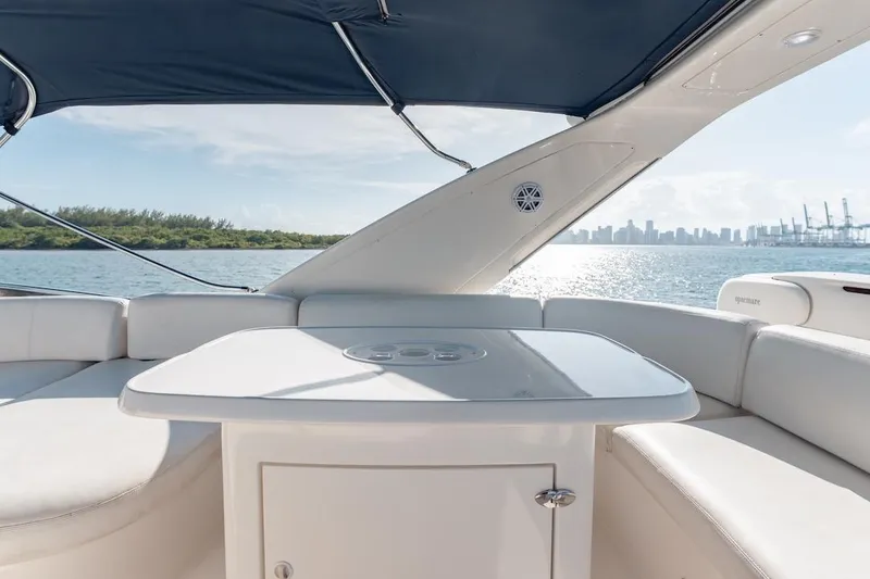 Slide: The Image of Luxurious 2007 Azimut 62 Evolution yacht interior with elegant seating and ocean view. - 38
