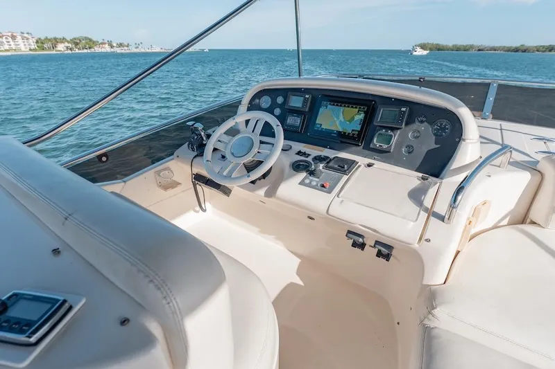 Slide: The Image of Cockpit of 2007 Azimut 62 Evolution yacht with navigation equipment and ocean view. - 39